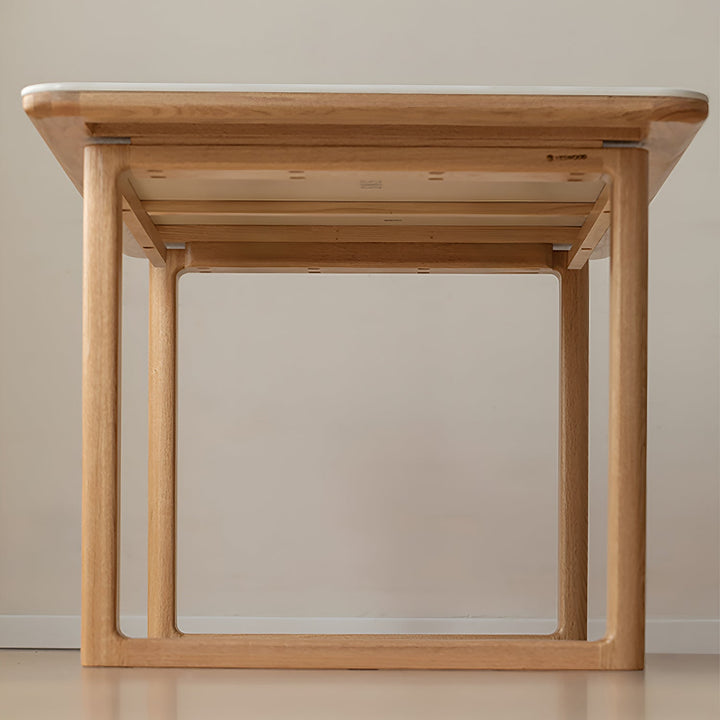 Scandinavian oak wood sintered stone dining table anchor in panoramic view.