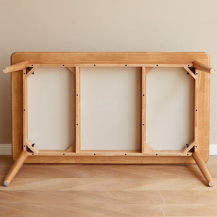 Scandinavian oak wood sintered stone dining table forme in still life.