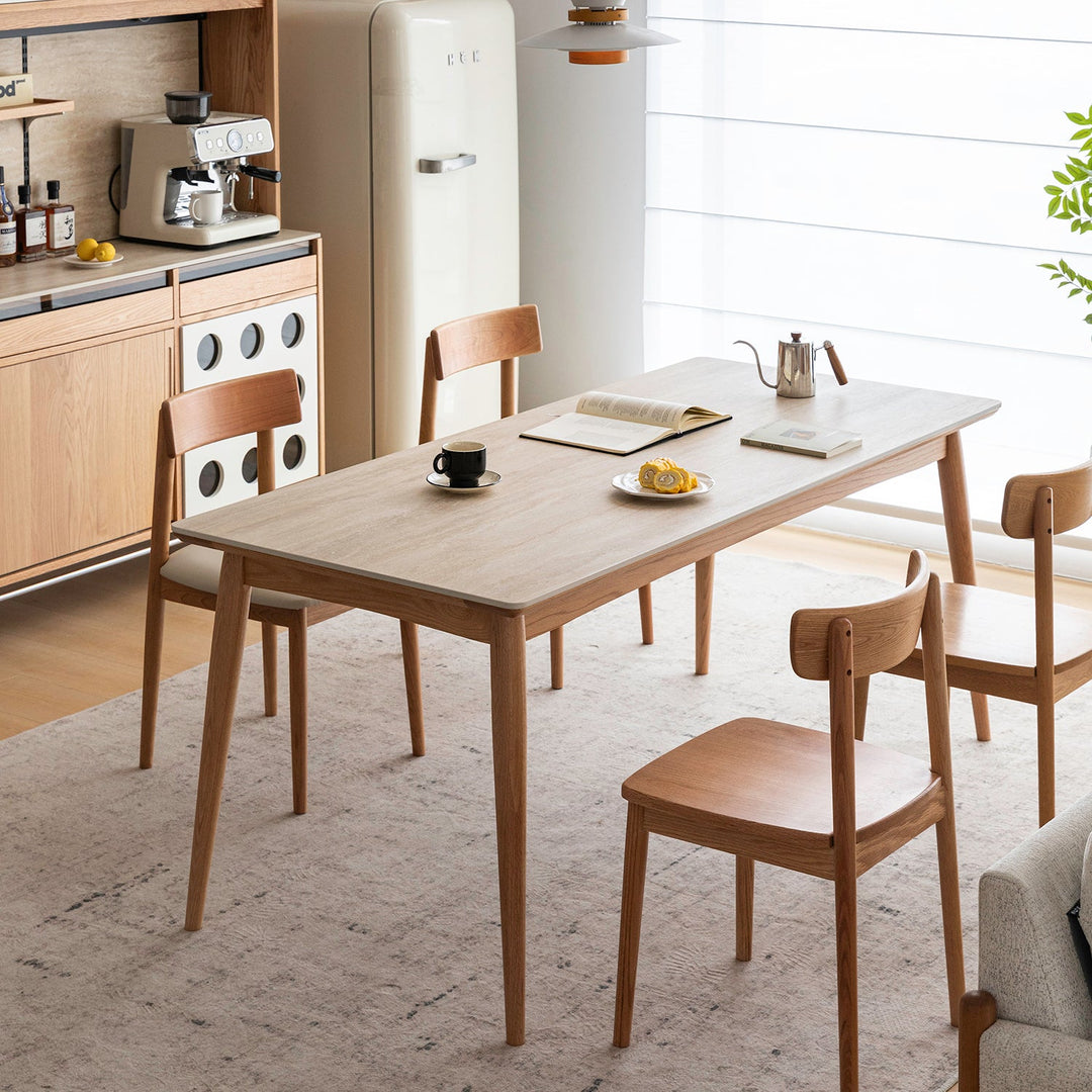 Scandinavian oak wood sintered stone dining table green with context.