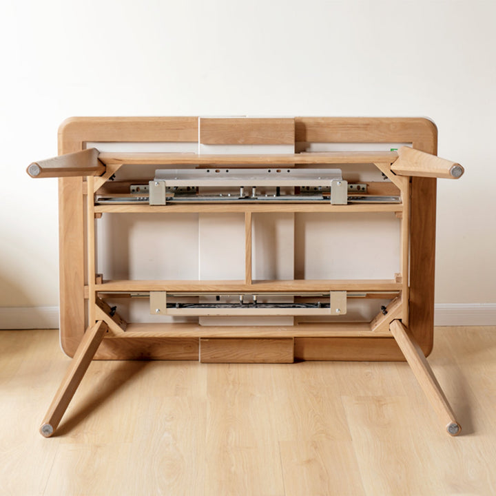 Scandinavian oak wood sintered stone extendable dining table shift in panoramic view.