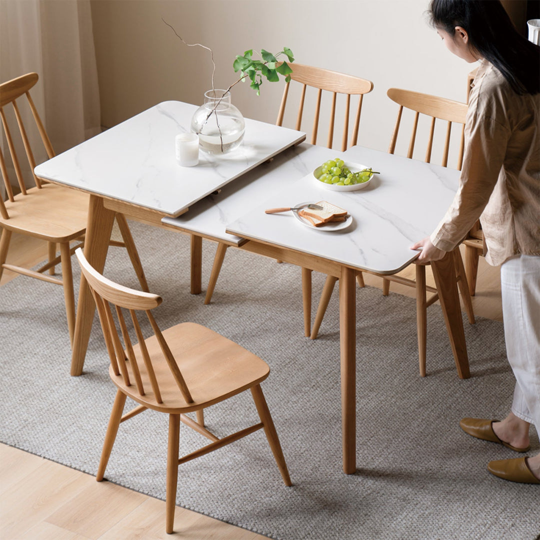 Scandinavian oak wood sintered stone extendable dining table shift primary product view.