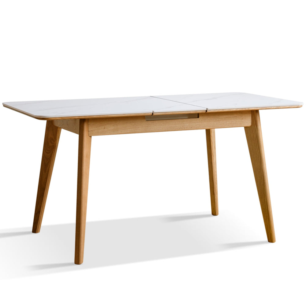 Scandinavian oak wood sintered stone extendable dining table shift in white background.