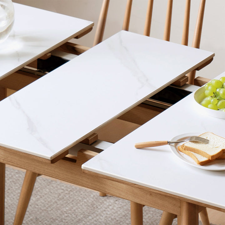 Scandinavian oak wood sintered stone extendable dining table shift with context.