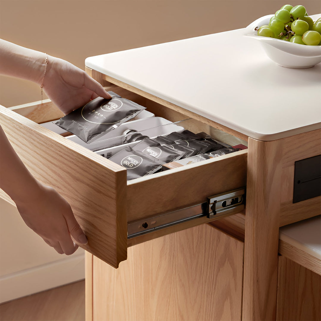 Scandinavian oak wood sintered stone extendable island dining table with cabinet flexa in still life.