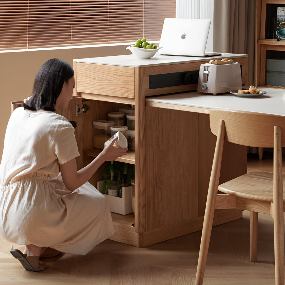 Scandinavian oak wood sintered stone extendable island dining table with cabinet flexa in details.
