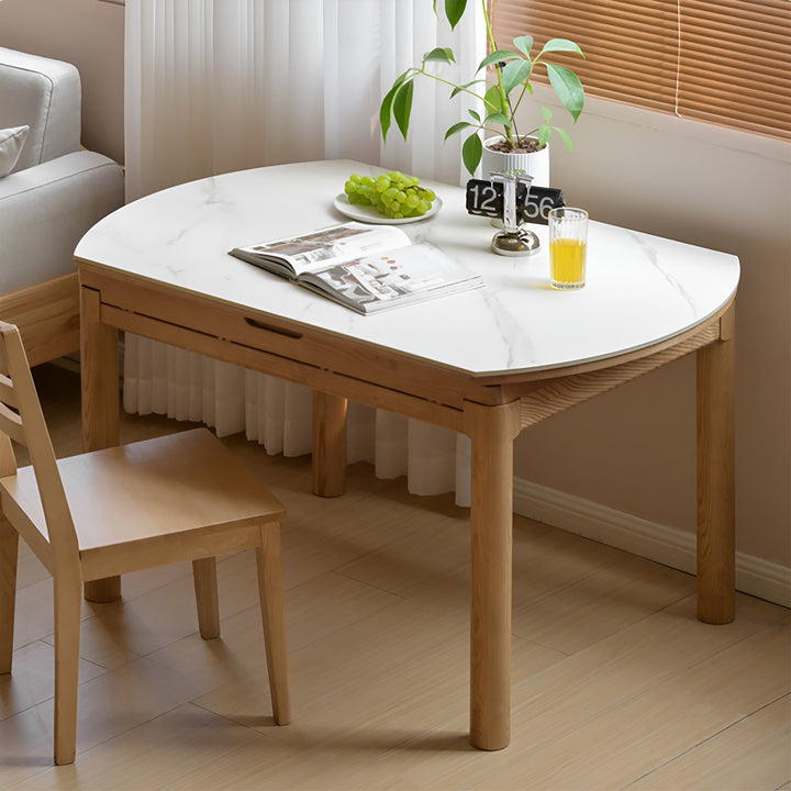 Scandinavian oak wood sintered stone extendable round dining table orbit material variants.