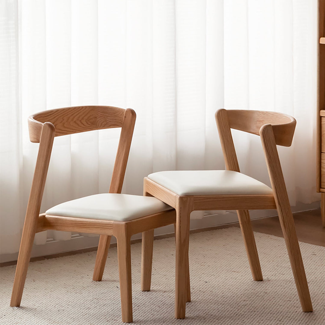 Scandinavian oak wood sintered stone stackable dining table set noki in panoramic view.