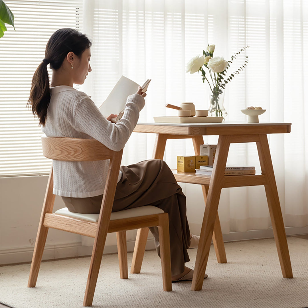 Scandinavian oak wood sintered stone stackable dining table set noki in real life style.