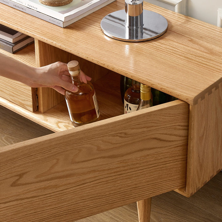 Scandinavian oak wood tv console berry in close up details.