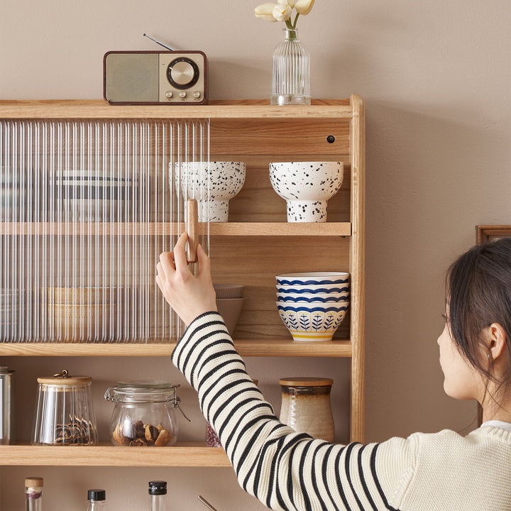 Scandinavian oak wood wall hanging cabinet hemu in real life style.
