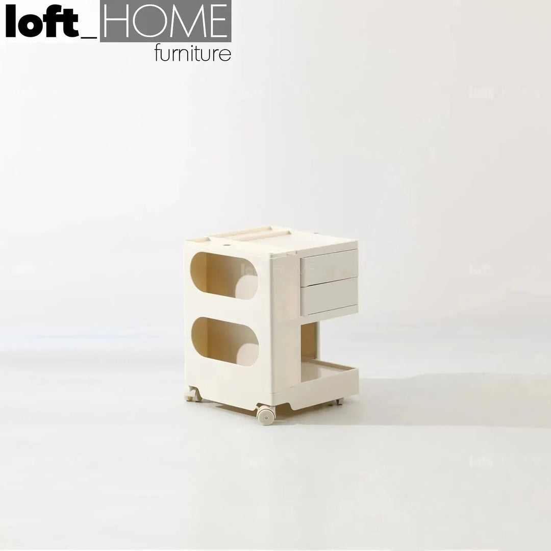 Contemporary plastic wheeled trolley side table boby small in still life.