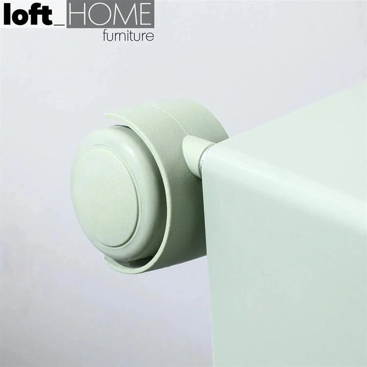 Contemporary plastic wheeled trolley side table rolly in close up details.