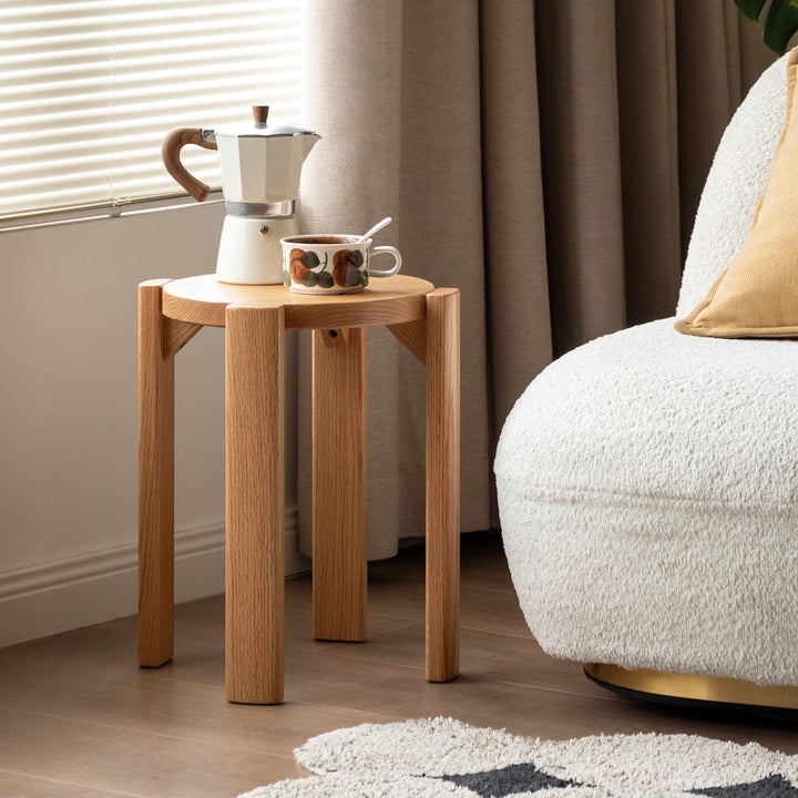 Scandinavian rubber wood stackable stool with wheels friday in close up details.