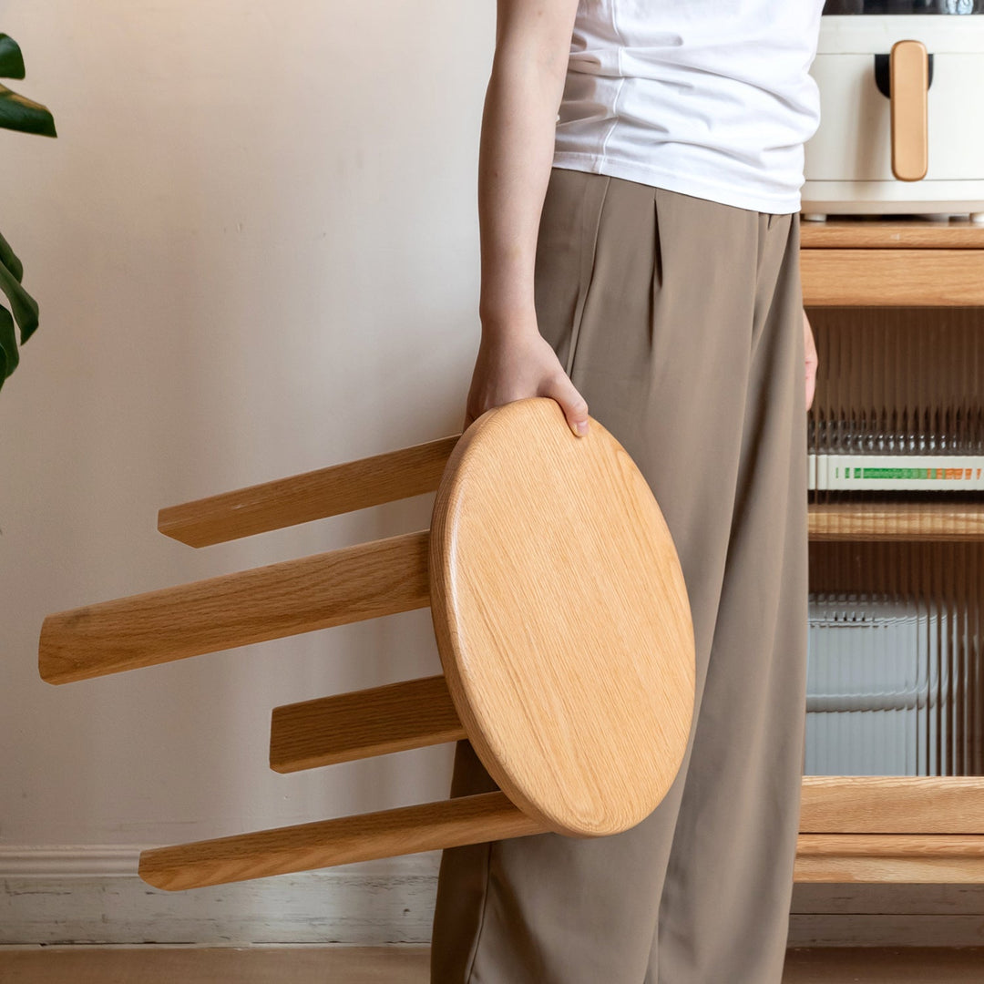 Scandinavian rubber wood stackable stool with wheels friday in panoramic view.