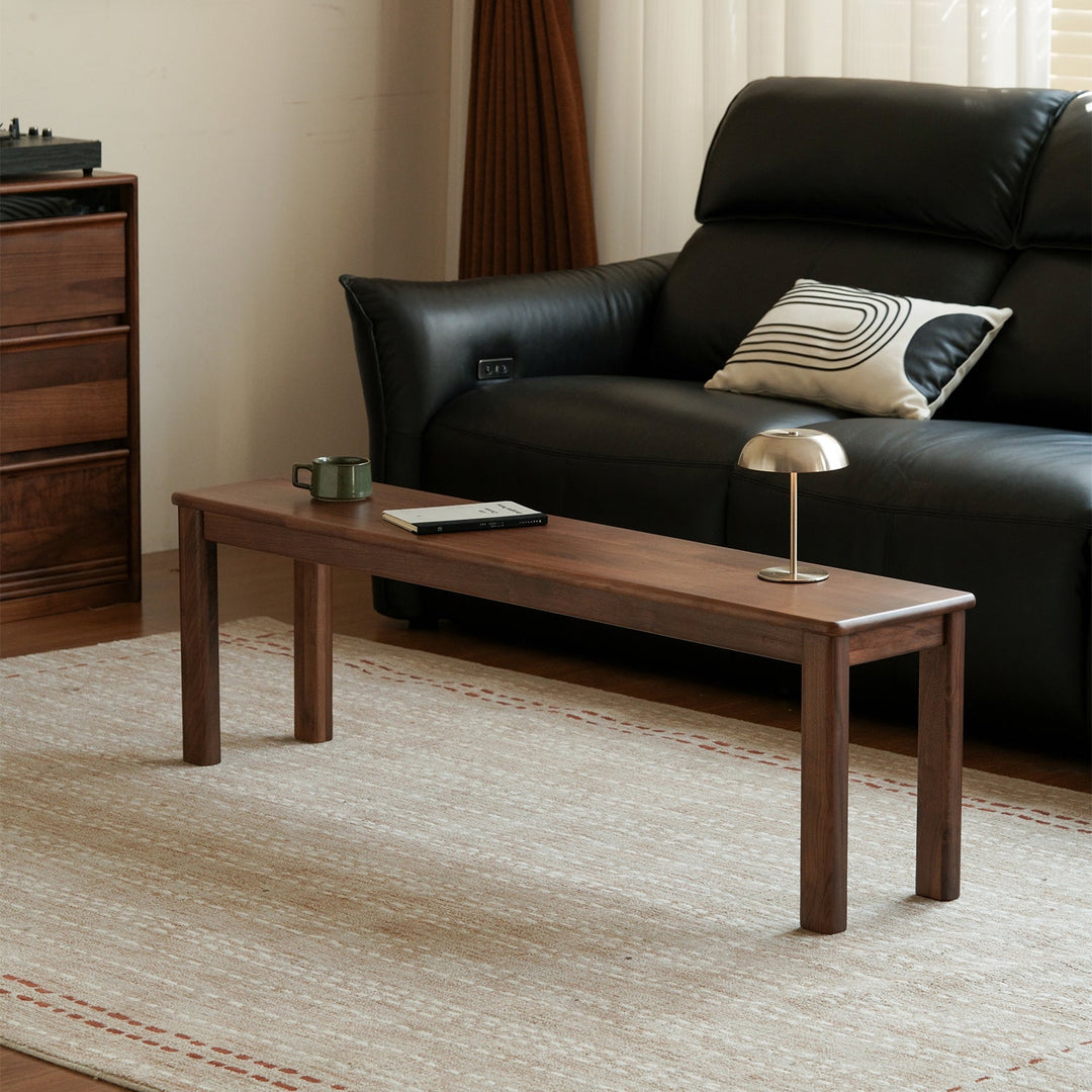 Scandinavian wood dining bench axel with context.