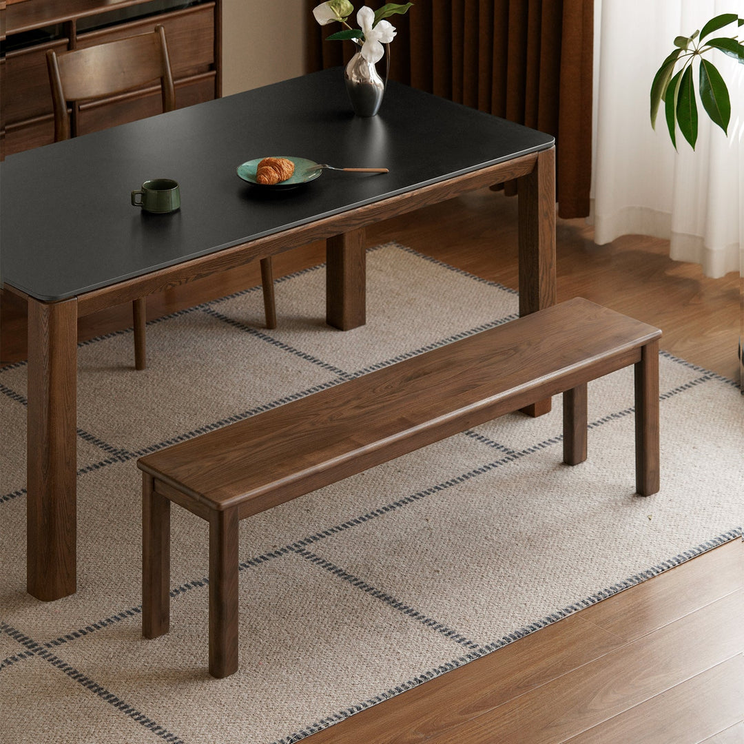 Scandinavian wood dining bench axel in close up details.