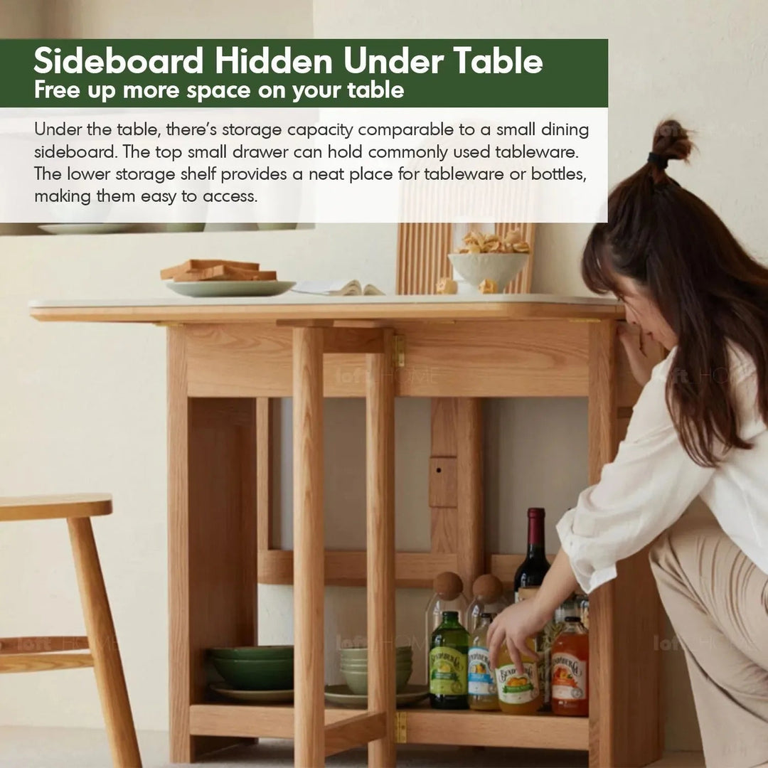 Scandinavian wood foldable extendable dining table hemu in panoramic view.