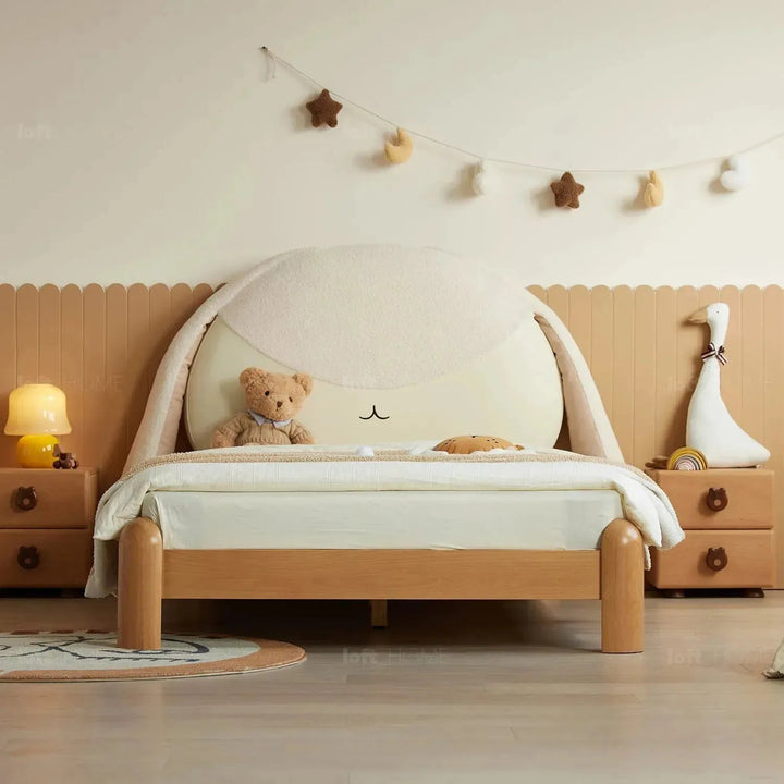 Cream wood kids bed bunny in details.