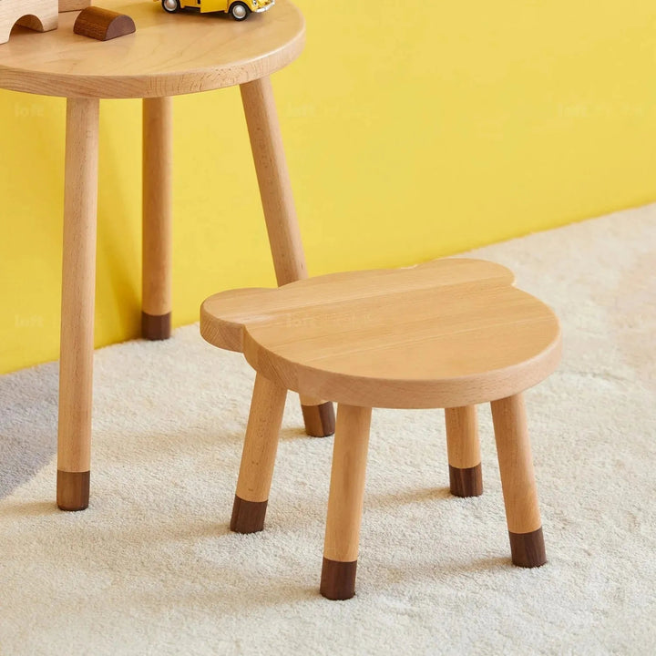 Scandinavian wood kids stool bear in details.