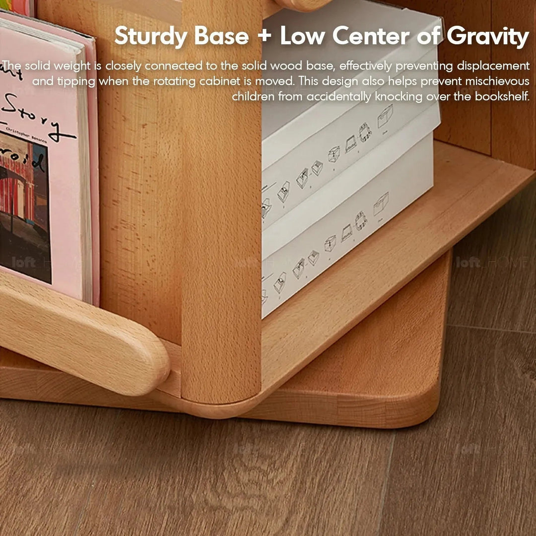 Scandinavian wood kids swirling bookshelf snug in panoramic view.