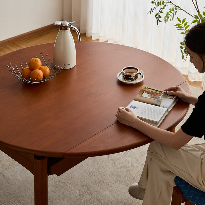 Vintage boxwood extendable dining table minima in panoramic view.