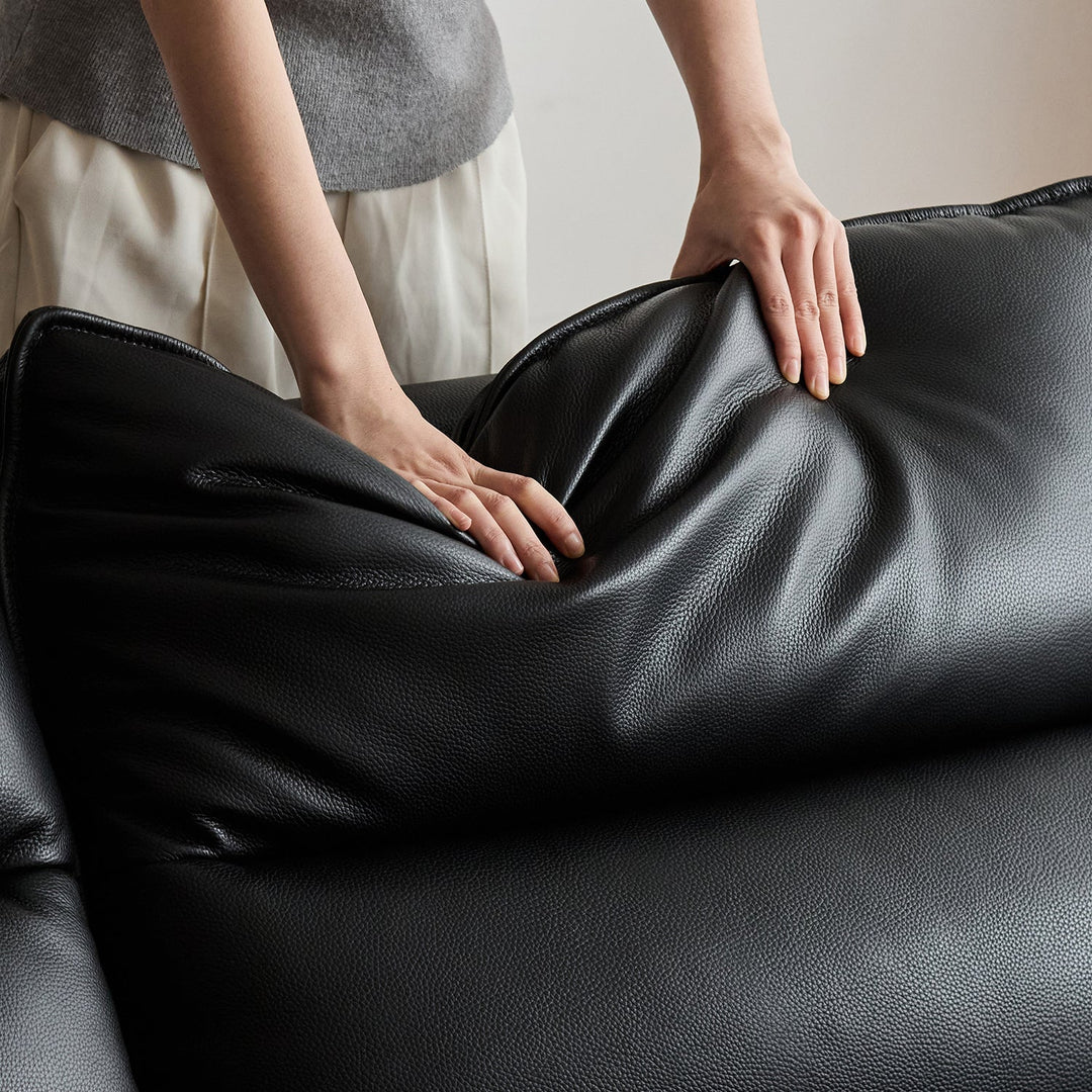 Vintage boxwood genuine leather electric recliner 3 seater sofa edgeless in still life.