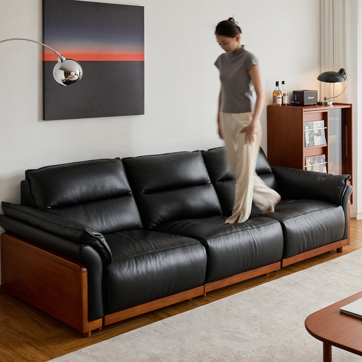 Vintage boxwood genuine leather electric recliner 4 seater sofa edgeless in still life.