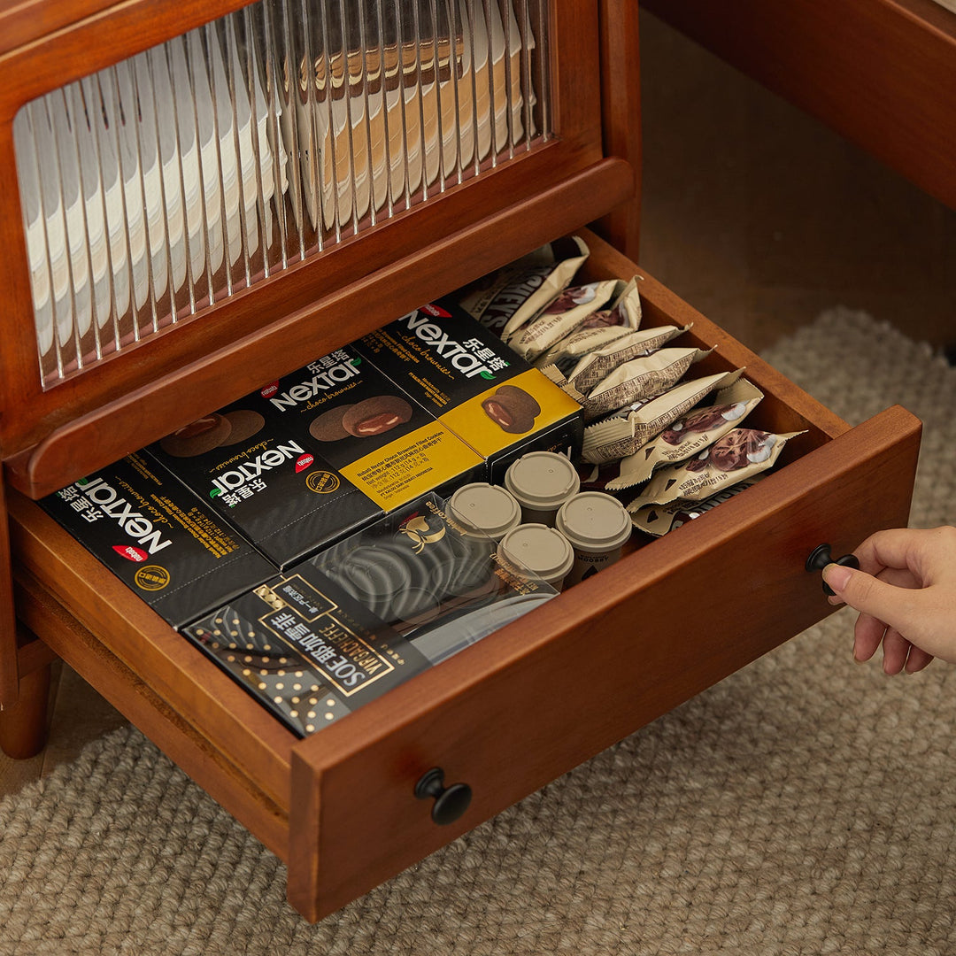 Vintage boxwood side table cuckoo in panoramic view.