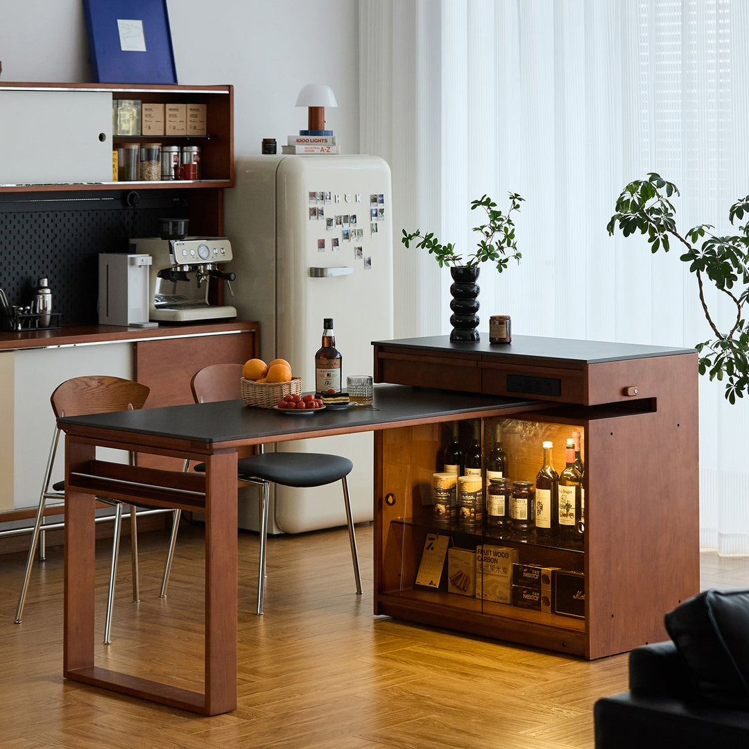 Vintage boxwood sintered stone extendable island dining table with cabinet skeletal in still life.