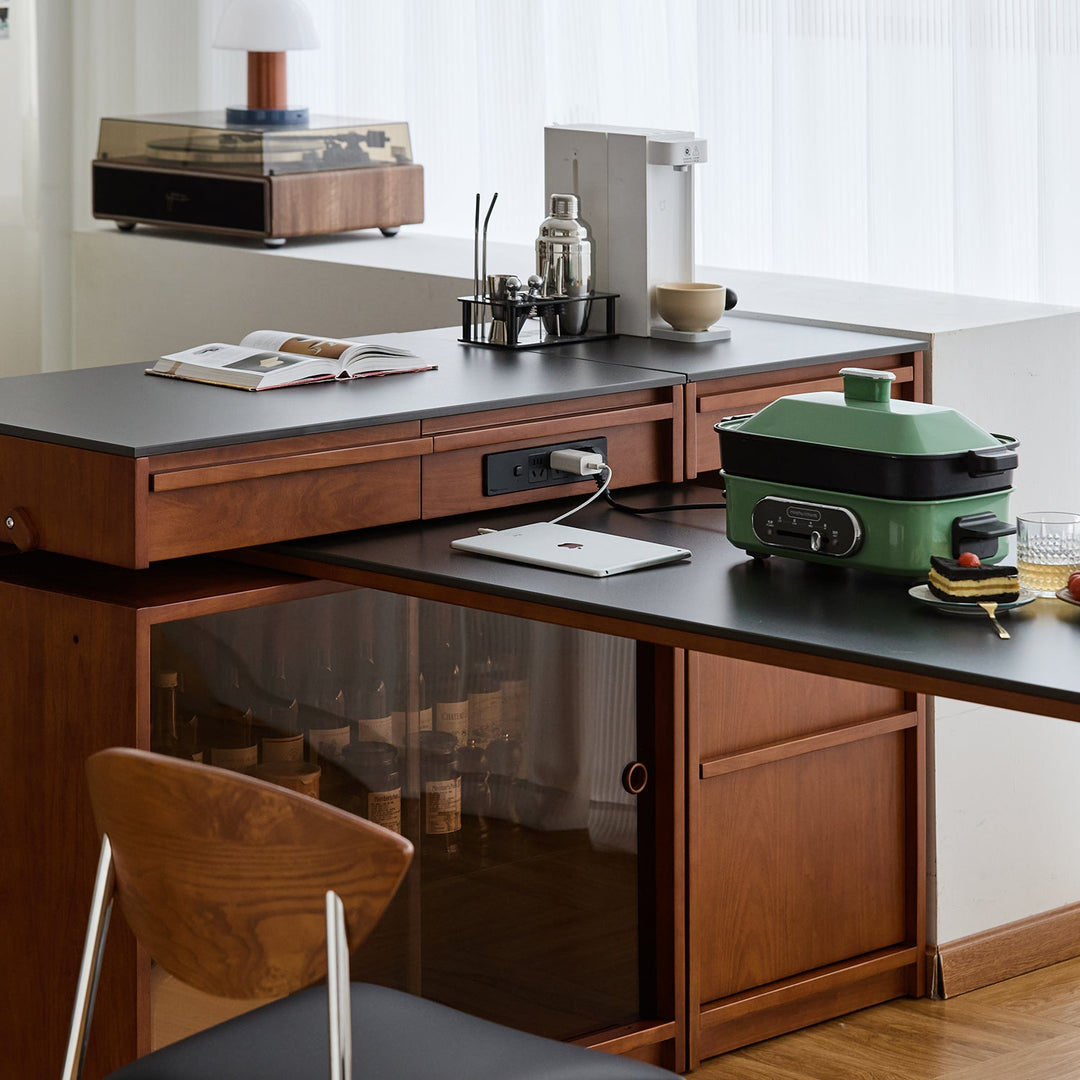Vintage boxwood sintered stone extendable island dining table with cabinet skeletal detail 1.