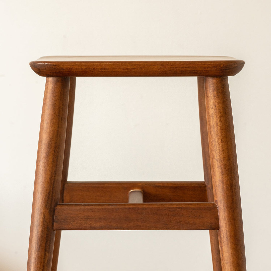 Vintage boxwood stool mellow in real life style.