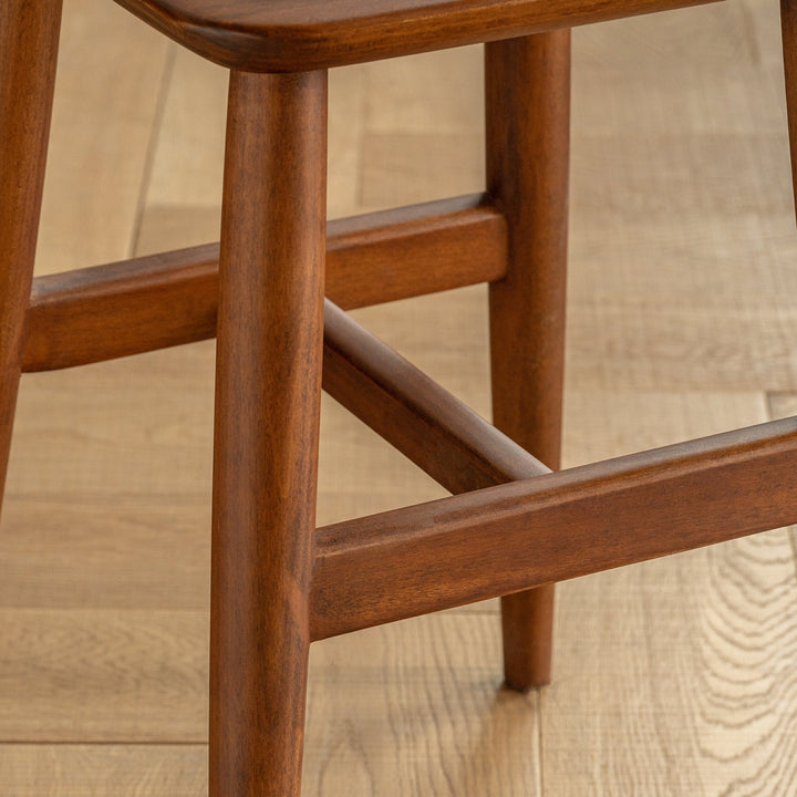 Vintage boxwood stool mellow in details.