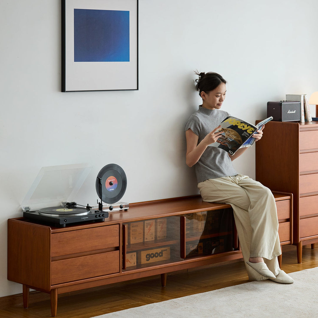 Vintage boxwood tv console vista in close up details.