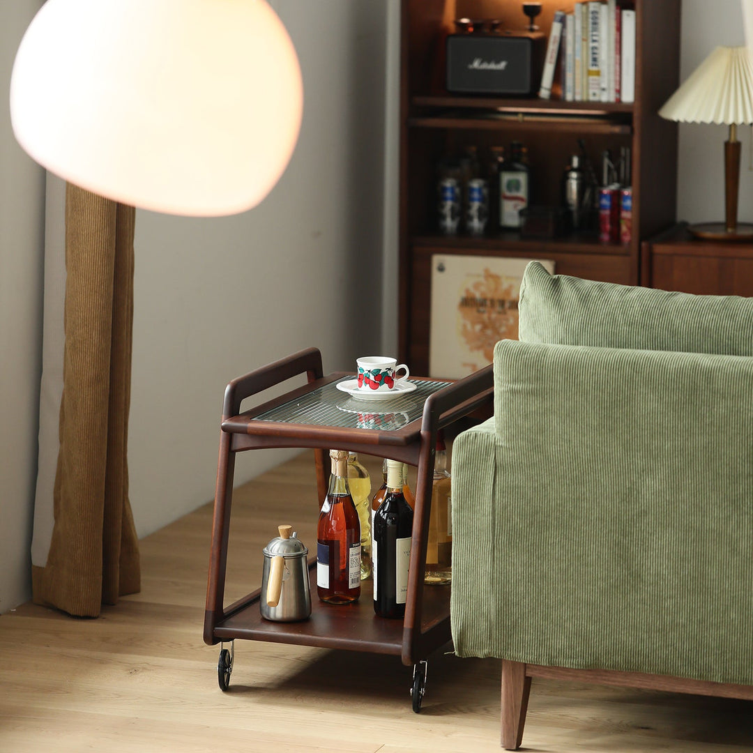 Vintage boxwood wheeled trolley side table yoyo in close up details.
