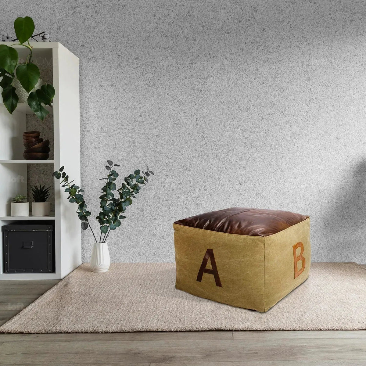 Vintage canvas ottoman alphabet with context.