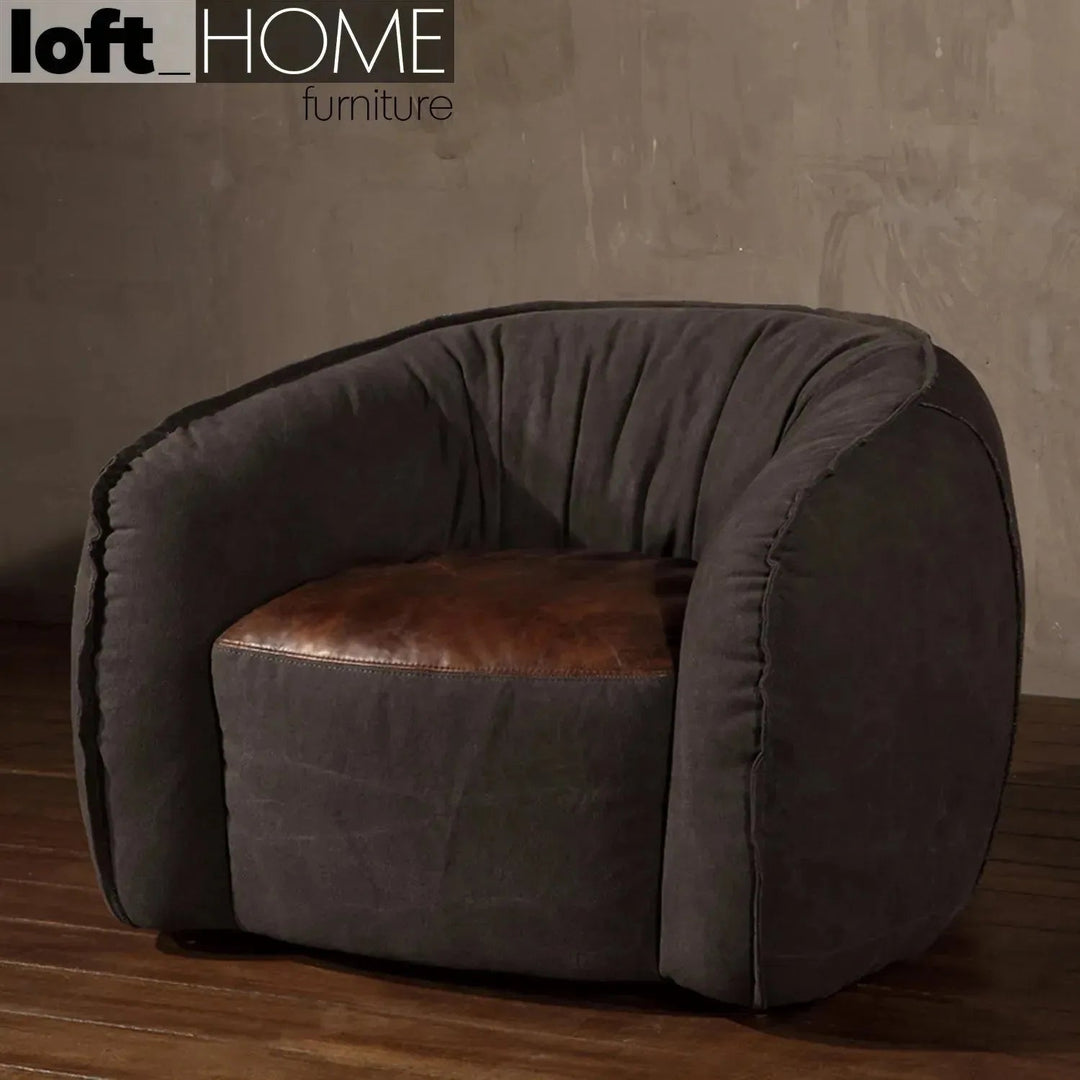 Vintage fabric and genuine leather 1 seater sofa bread with context.