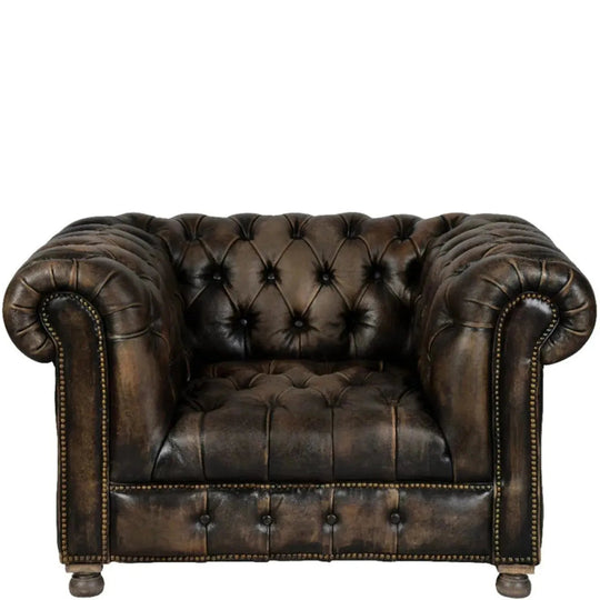 Vintage genuine leather 1 seater sofa chesterfield button in white background.