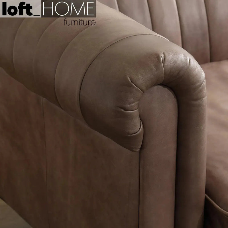 Vintage genuine leather 1 seater sofa elis with context.