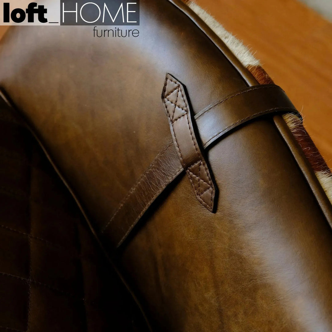 Vintage genuine leather 1 seater sofa moo with context.