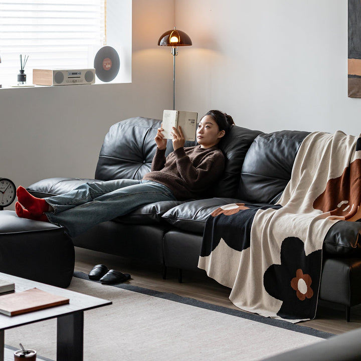Vintage genuine leather 1 seater sofa riga with context.