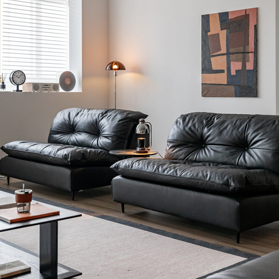 Vintage genuine leather 1 seater sofa riga in close up details.