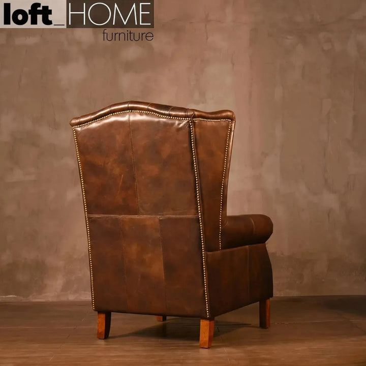 Vintage genuine leather 1 seater sofa wing l with context.