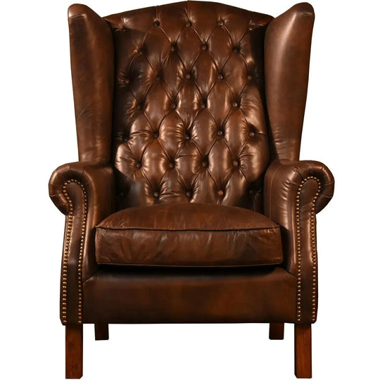 Vintage genuine leather 1 seater sofa wing l in white background.