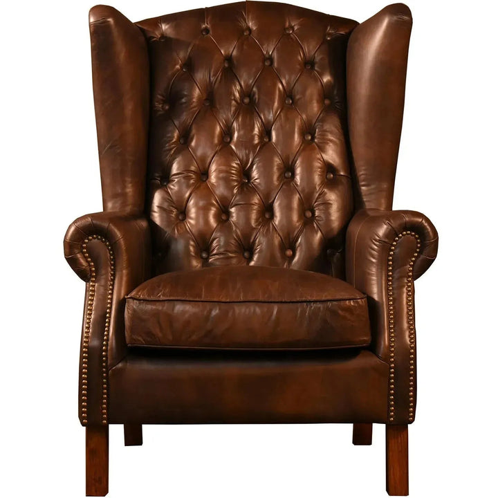 Vintage genuine leather 1 seater sofa wing l in white background.