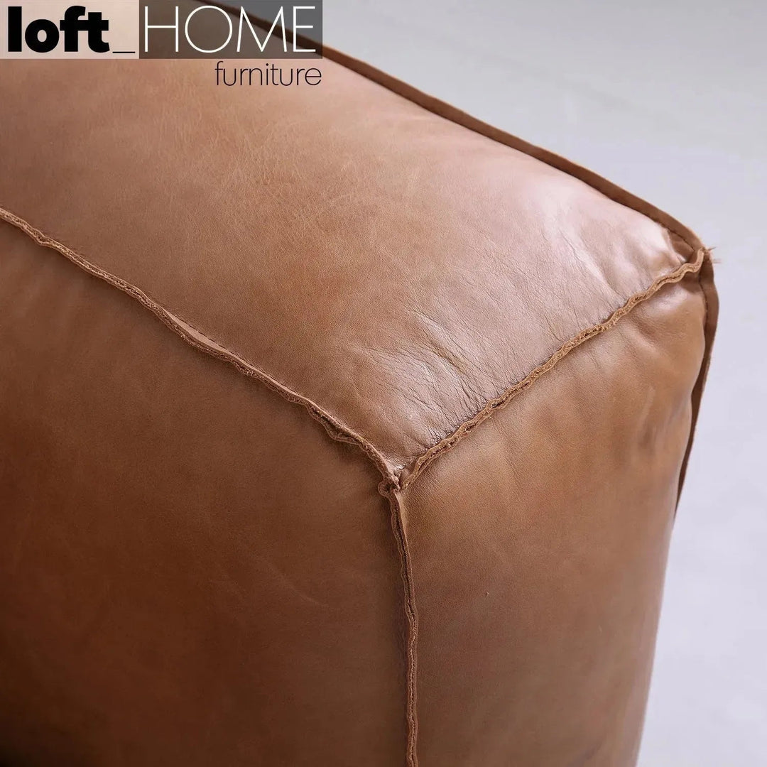 Vintage genuine leather 2 seater sofa antique master in close up details.