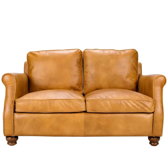 Vintage genuine leather 2 seater sofa barclay in white background.
