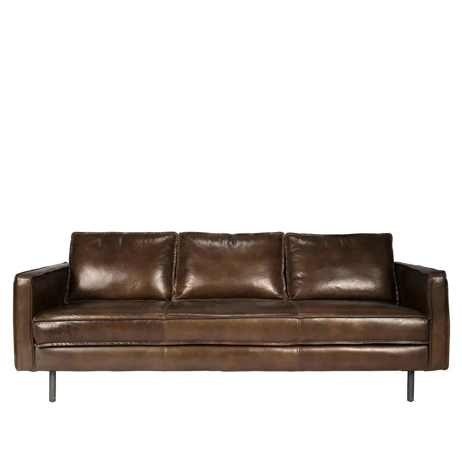 Vintage genuine leather 2 seater sofa belgian in white background.