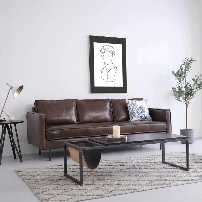 Vintage genuine leather 2 seater sofa belgian in real life style.
