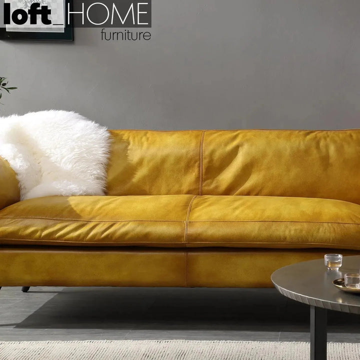 Vintage genuine leather 2 seater sofa magina with context.