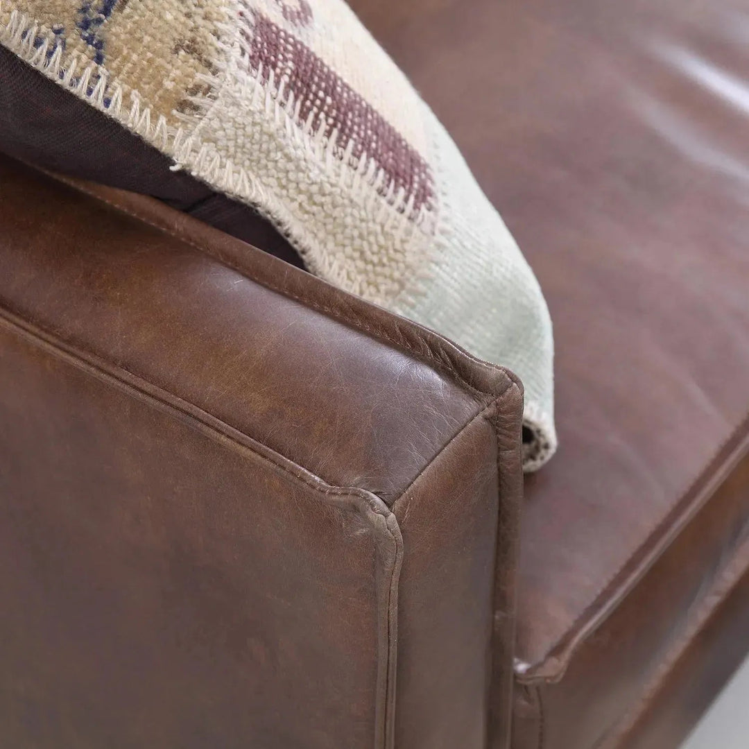 Vintage genuine leather 3 seater sofa belgian in panoramic view.